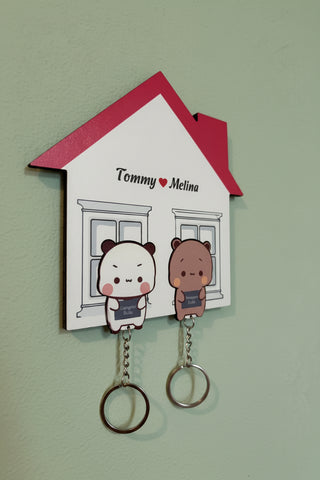 Key holder with cartoon characters and personalized names on a beige background dudu bubu